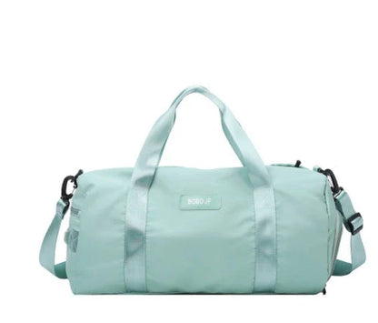 Premium durable fitness gym bag with separate compartments for shoes, laundry, and other gear, made of water-resistant materials for versatile use