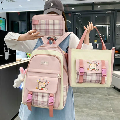 Large capacity plaid three-piece school backpack set in nylon with pink, blue, black, or purple colour options for junior high students
