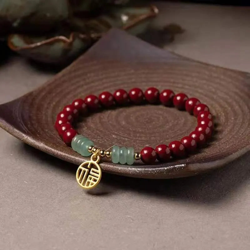 Handmade gold cinnabar wave bracelet with copper beads in national style.