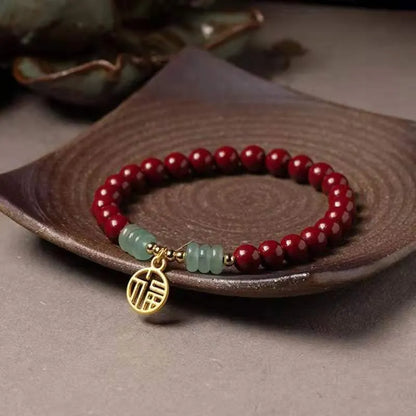 Handmade gold cinnabar wave bracelet with copper beads in national style.