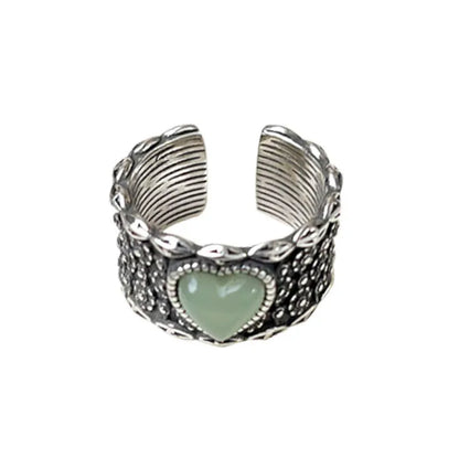 Retro wide-faced heart-shaped silver ring with adjustable opening in white or green colour