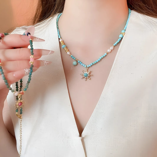 French court style freshwater pearl necklace with stone sun pendant on clavicle chain