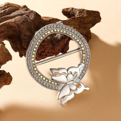 Bow-shaped waist-cinching accessory clip for high-end brooches, alloy with electroplating and diamond inlay, shown in gold, silver, or rose gold finishes.