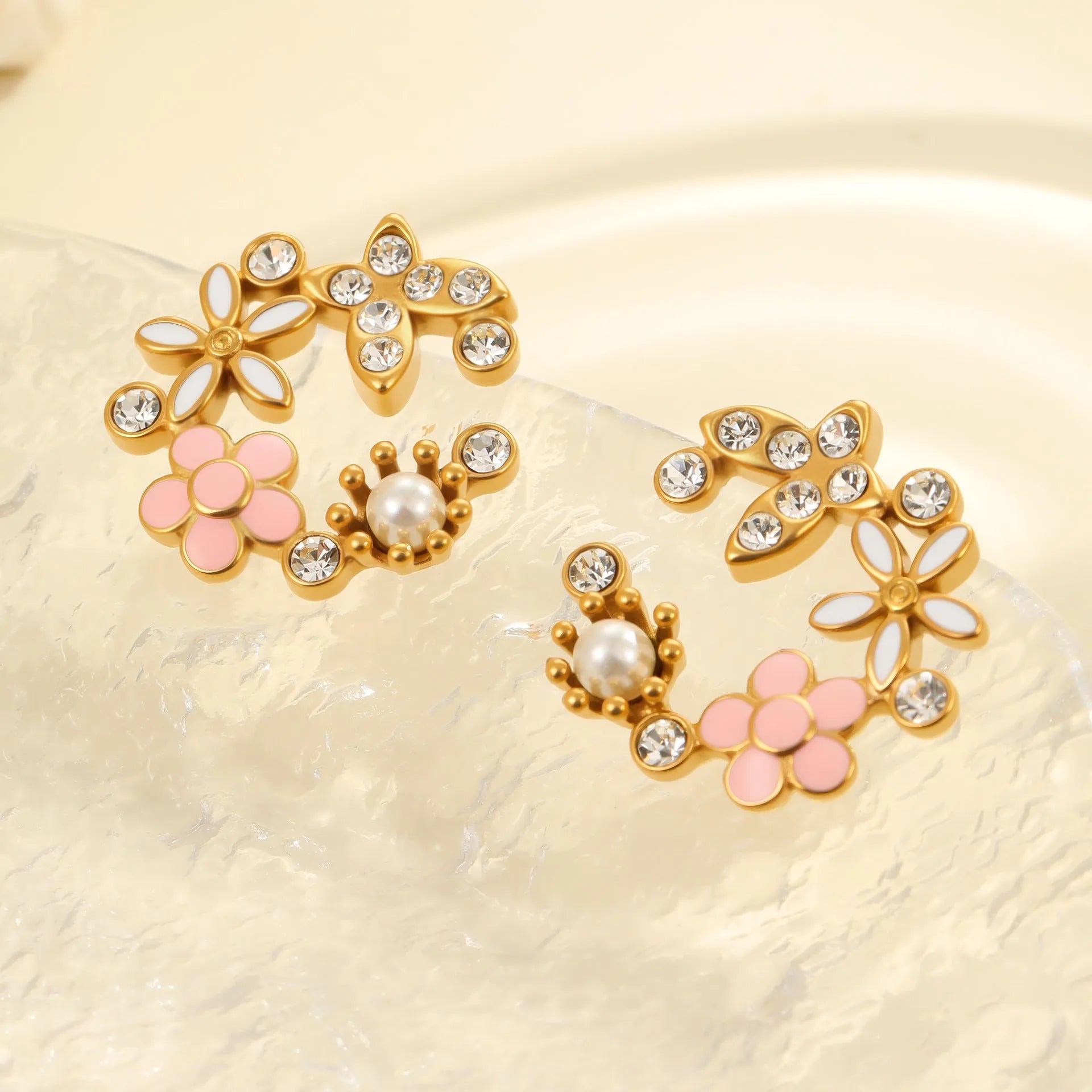 Stainless steel flower stud earrings with 18K gold electroplating and colourful diamond oil pendant