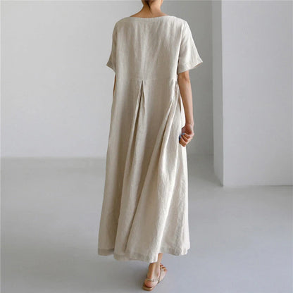 Comfortable cotton linen round neck dress in navy blue, army green, and apricot colors, perfect for casual wear.