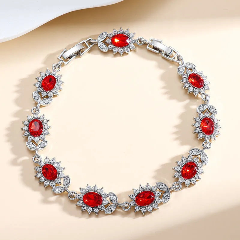 Personality Trend adjustable alloy bracelet with inlaid zircon stones in a choice of nine gemstone colours on a wrist.