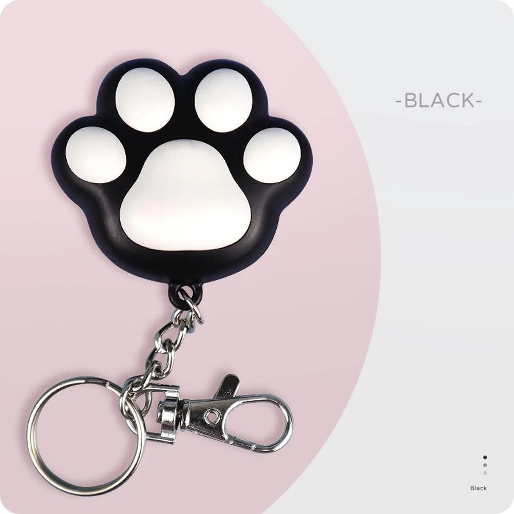 Pink and black infrared cat teaser toy with key chain measuring 5 by 2.5 centimetres