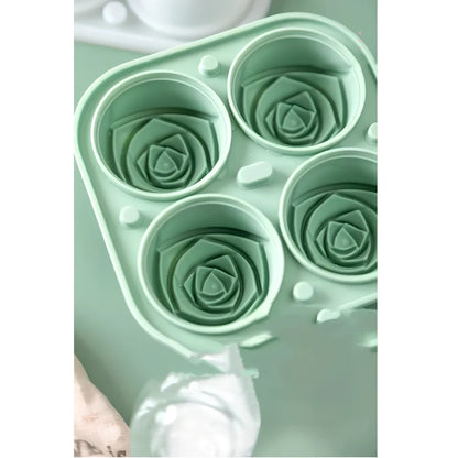 Orange silicone ice mould with 2.5-inch rose shapes and built-in filling funnel