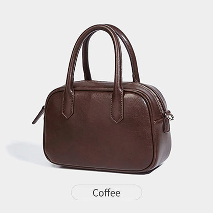 Retro square PU leather messenger bag with an adjustable shoulder strap in black colour.