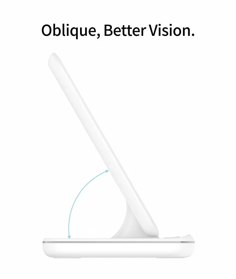 White three-in-one wireless charging stand for mobile phone, watch, and headphones on a desk.
