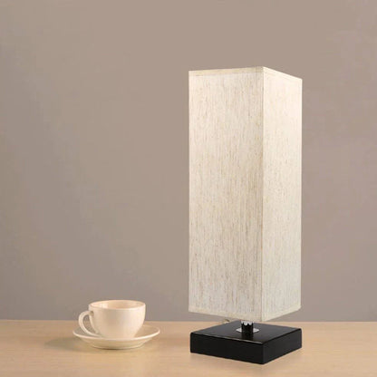 Modern square table lamp with linen cloth cover and petal-shaped design measuring 10.5cm