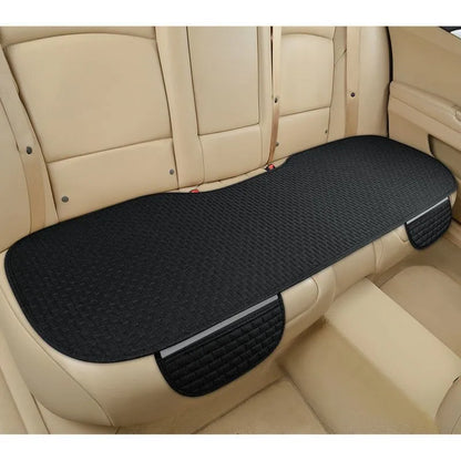 Linen car cushion with plaid pattern in cream colour on automotive seat