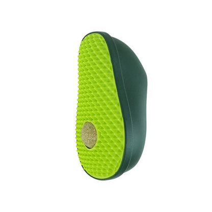 Green avocado-shaped cat toy with a central scratching post for cats.