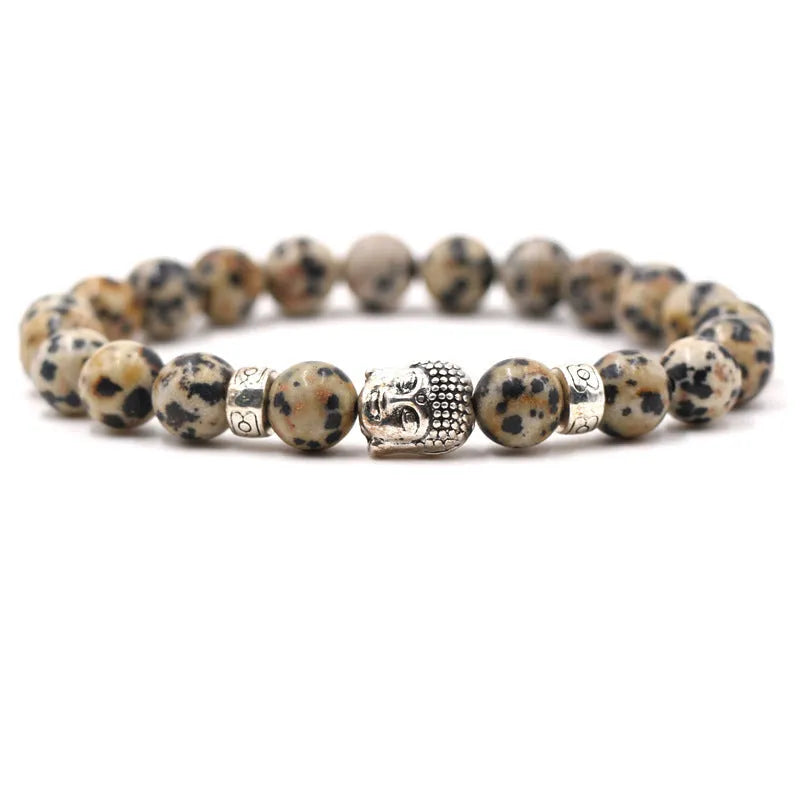 Natural stone stretch bracelet with round beads in various colours including Tigereye and turquoise.