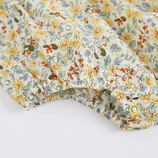 Yellow floral baby one-piece pants with triangle jumpsuit design and doll collar for girls 0-3 years
