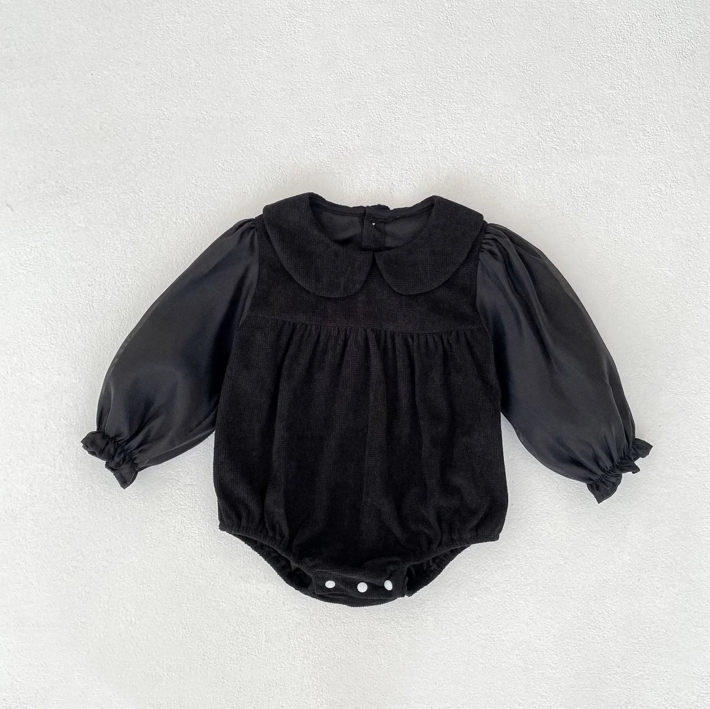 Corduroy doll collar long sleeve baby romper in black or apricot with single-breasted closure