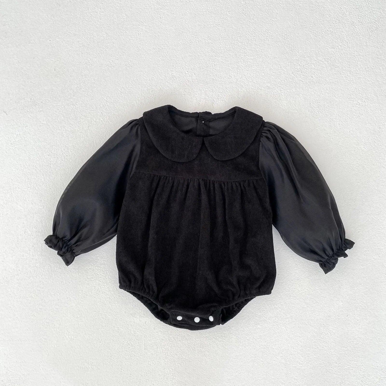 Corduroy doll collar long sleeve baby romper in black or apricot with single-breasted closure