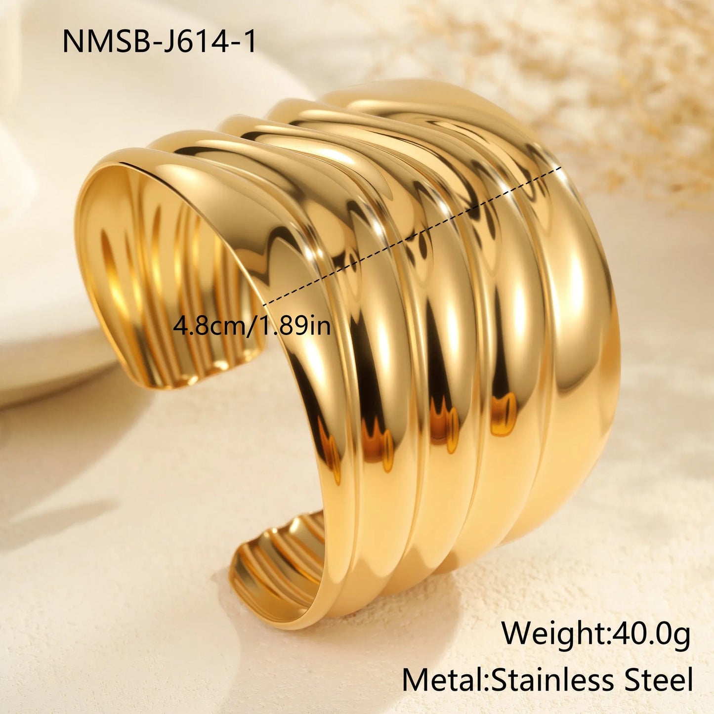 Women's gold-plated wide bracelet with exaggerated niche opening and geometric wave design