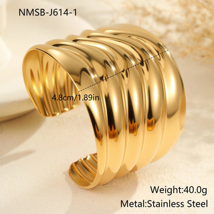 Women's gold-plated wide bracelet with exaggerated niche opening and geometric wave design