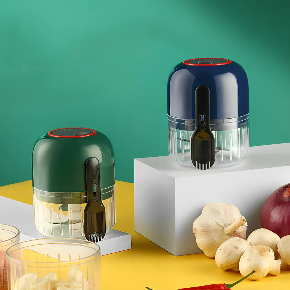Blue electric garlic masher with USB charging cable, showing 11.5cm height