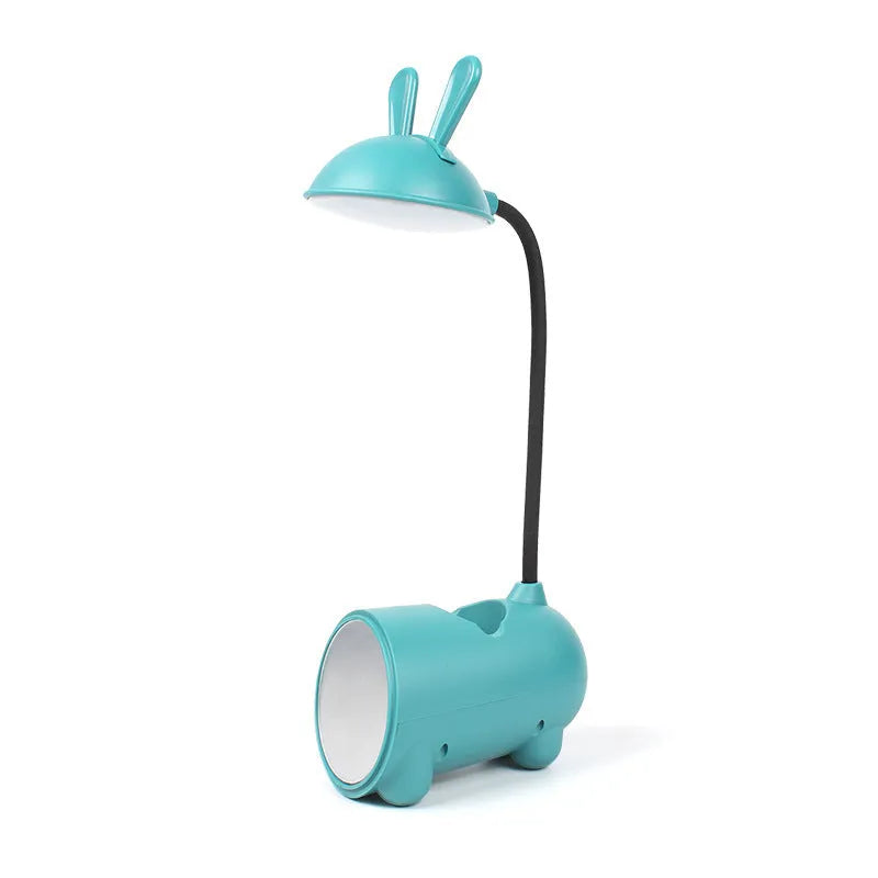 Modern green plastic USB table lamp with a long built-in pen holder on a wooden desk.