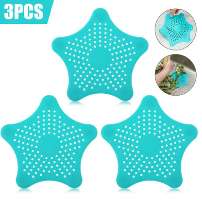 Three starfish-shaped sink drain filters in white, blue and green colours showing suction cups on bottom
