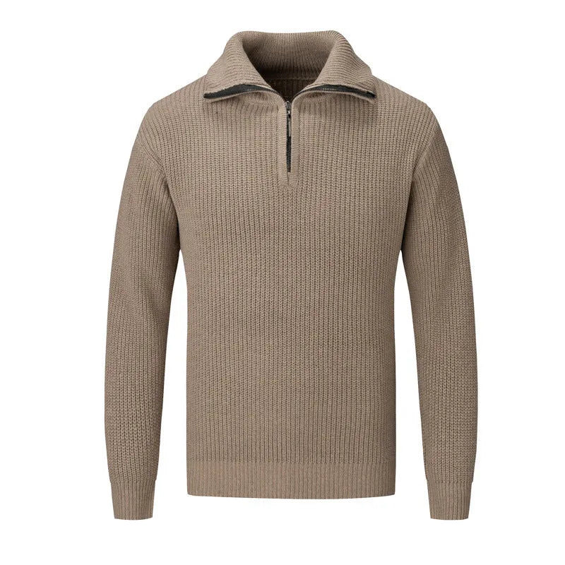 A man wearing a solid-colour slim-fit loose pullover sweater in a neutral colour.