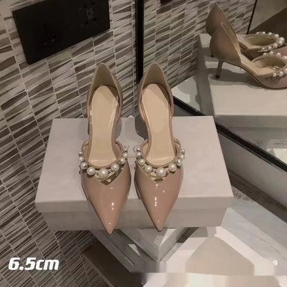Women's pointed toe patent leather look stiletto high heels in nude, black or white with sheepskin lining.