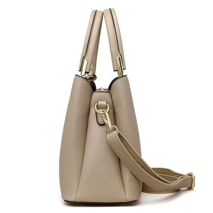 Women's black PU leather messenger bag with multi-layer shoulder strap and sewing thread detailing.