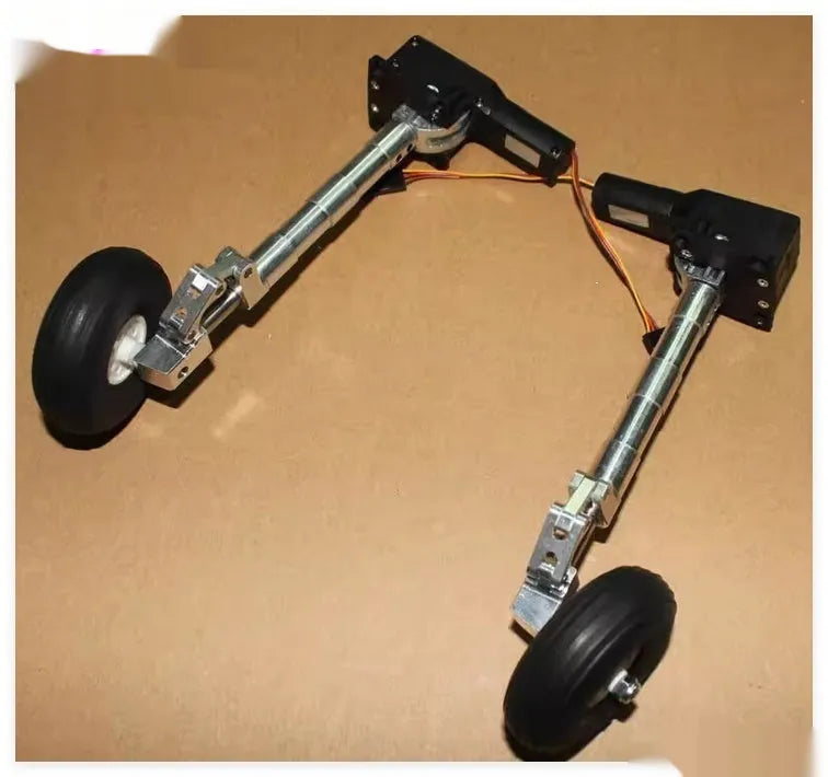 Retractable alloy landing gear for RC plane with shock absorber and large wheel.