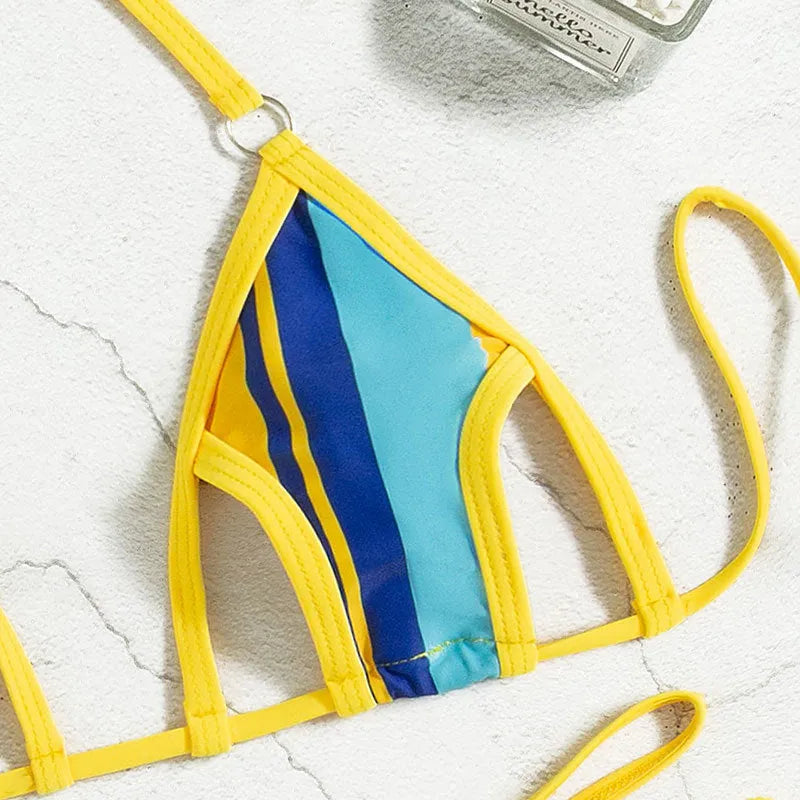 Yellow high-waist backless split swimsuit for women with neck-hanging hollow suit design.
