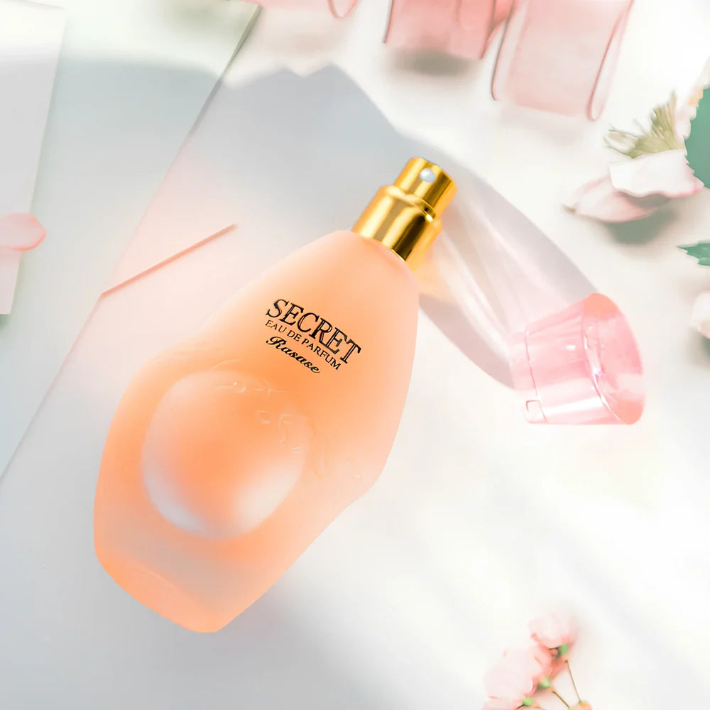 Paris Night women's perfume in light pink with 75ml capacity and compact 13.5cm height