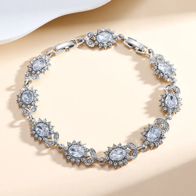 Personality Trend adjustable alloy bracelet with inlaid zircon stones in a choice of nine gemstone colours on a wrist.