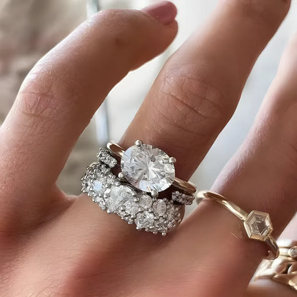 Women's white geometric alloy ring three-piece set with mosaic oval zircon detail, shown in sizes 6 to 10.