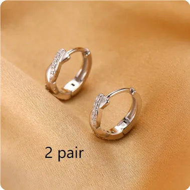 Gold geometric interwoven earrings with 1.5cm diameter hemp rope pattern and diamond-treated copper surface