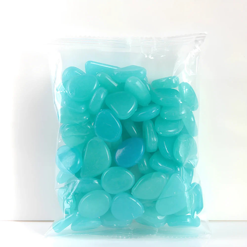 Blue, green, and white glow in the dark resin rocks for aquarium decoration with irregular shapes