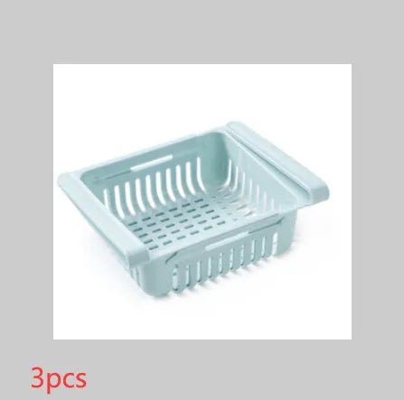 Plastic telescopic refrigerator storage basket in apricot colour, showing multiple compartments for organisation.