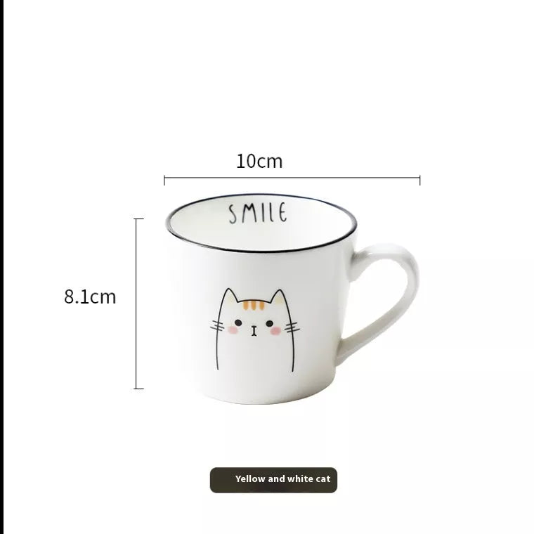Ceramic coffee cup with cartoon cat design, perfect for couples and coffee enthusiasts