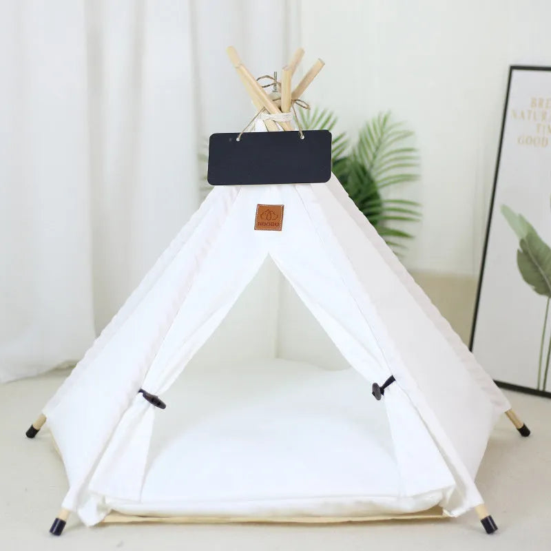 A striped pet teepee tent bed with a cushion inside, shown in a yellow colour option.