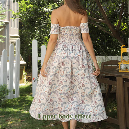 Women's off shoulder strapless floral dress in a lightweight fabric, available in multiple sizes.
