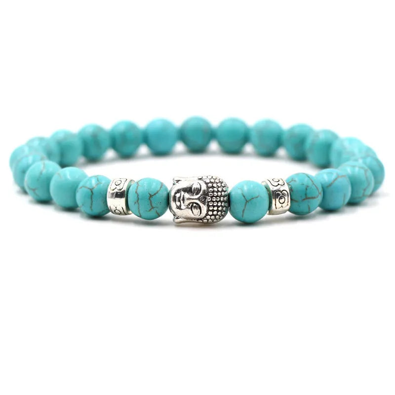 Natural stone stretch bracelet with round beads in various colours including Tigereye and turquoise.