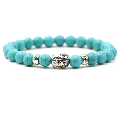 Natural stone stretch bracelet with round beads in various colours including Tigereye and turquoise.