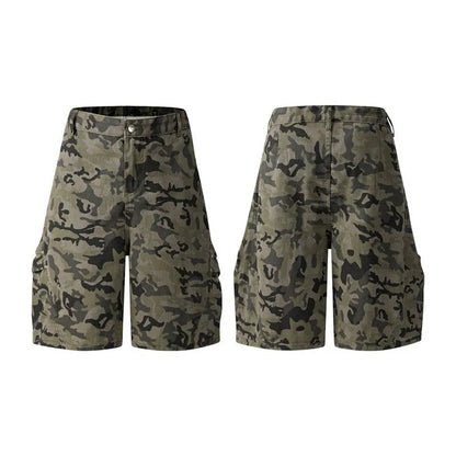 Retro loose-fit washed cotton workwear shorts in camouflage green colour with zip fly.