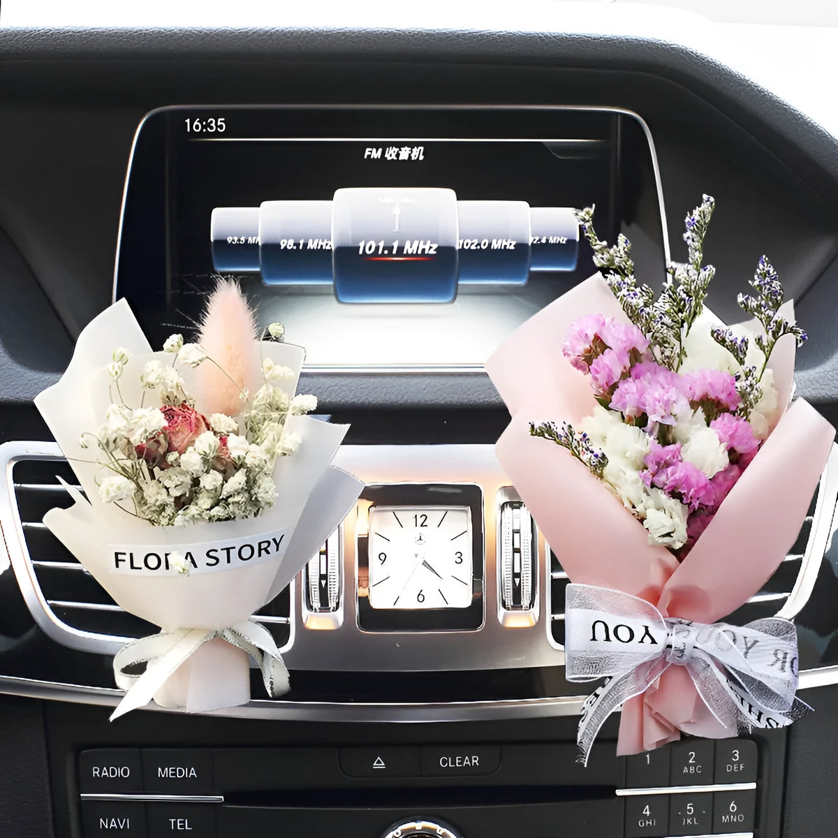 Mini dried flower bouquet mounted in car air vent for decorative aromatherapy