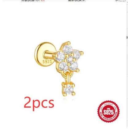 S925 sterling silver moon and star earrings with embedded diamond accents on a geometric design