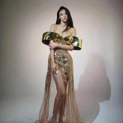 Gold strapless sequined tulle dress with thigh-high split and floor-length skirt
