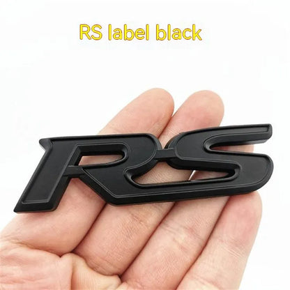 Zinc alloy metal car sticker with RS design measuring 9 by 2.4 centimetres