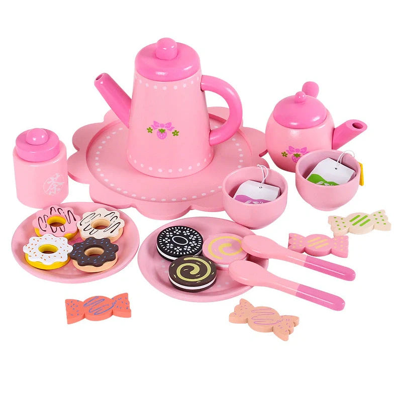 Wooden children's tea set in Barbara pink with cookie pattern, includes teapot and cups for pretend play