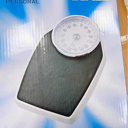 Black mechanical body weight scale with large dial, measuring 47x35x11cm