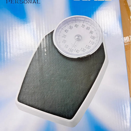 Black mechanical body weight scale with large dial, measuring 47x35x11cm